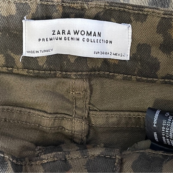 A comfortable pair of pants, "In olive green with black (leopard) spots." - Picture 2 of 3